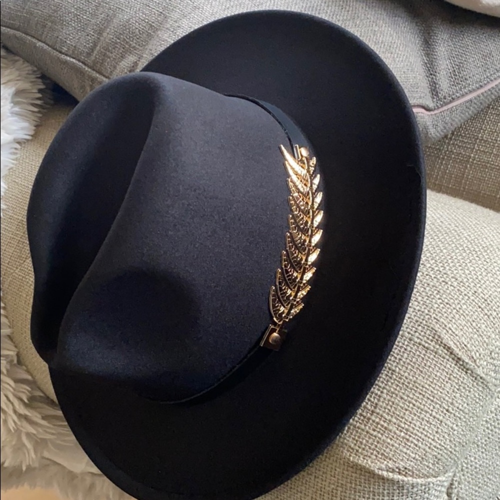 Felt fedora hat with feather trim